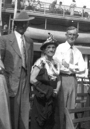 Pictured L-R:'Mr. Pick Russell,II', my grandfather Russell; 'Miss Kitty Russell', my grandmother Russell; and son Sanders Russell pictured aboard an excursion boat on a rare trip to the races at Roosevelt Raceway in the 1940s or early 1950s.
